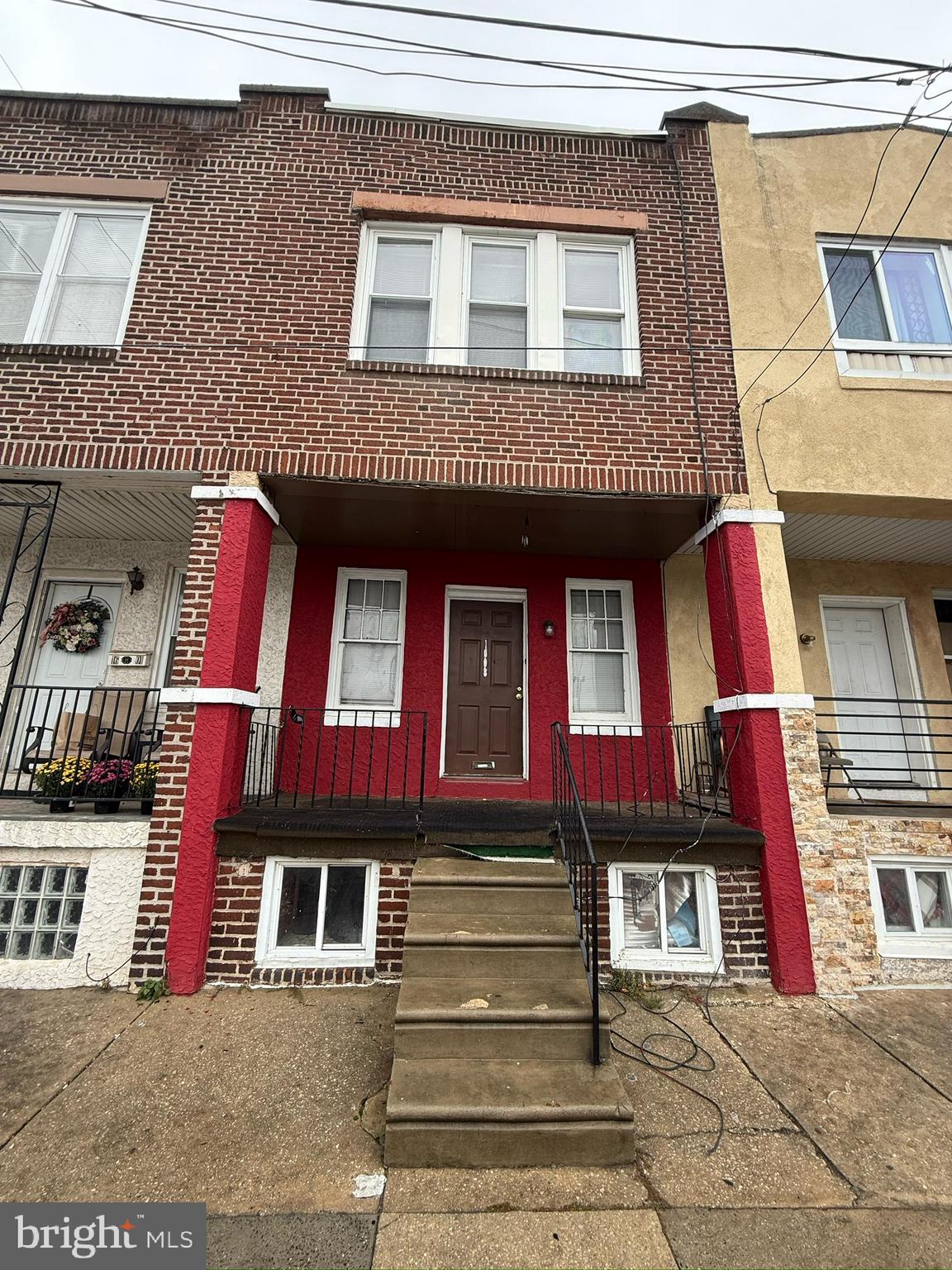 1603 South Dover Street Philadelphia, PA 19145 - Photo 1 of 12 a front view of residential houses
