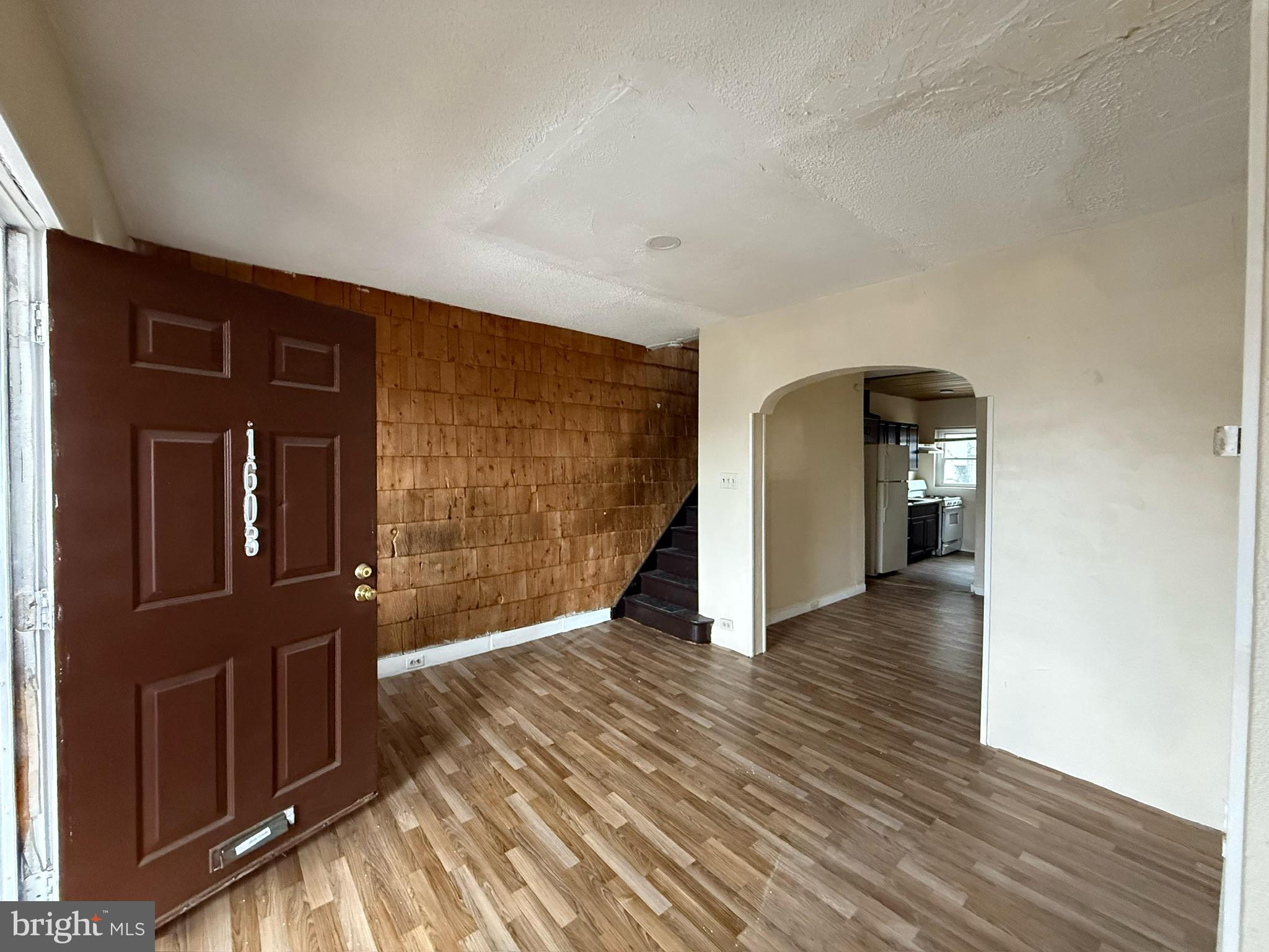 1603 South Dover Street Philadelphia, PA 19145 - Photo 2 of 12 a view of a livingroom with wooden floor