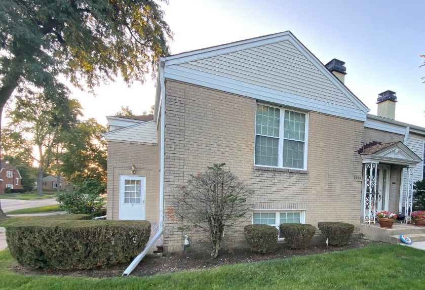 2944 Harlem Avenue, Unit 3 Riverside, IL 60546 - Photo 2 of 15 a view of a house with a yard and plants