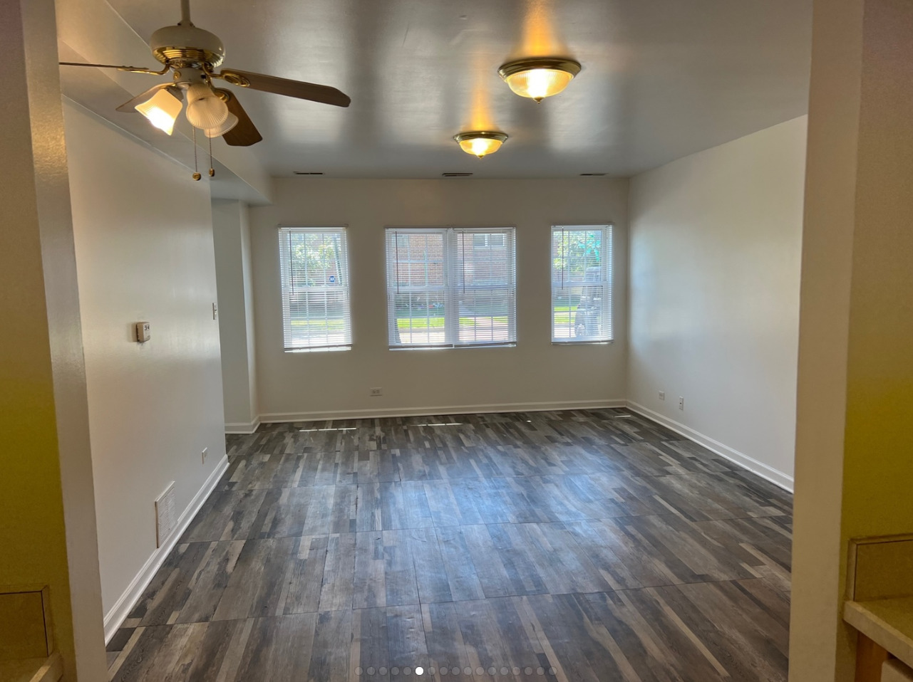 2944 Harlem Avenue, Unit 3 Riverside, IL 60546 - Photo 6 of 15 wooden floor in an empty room with a window