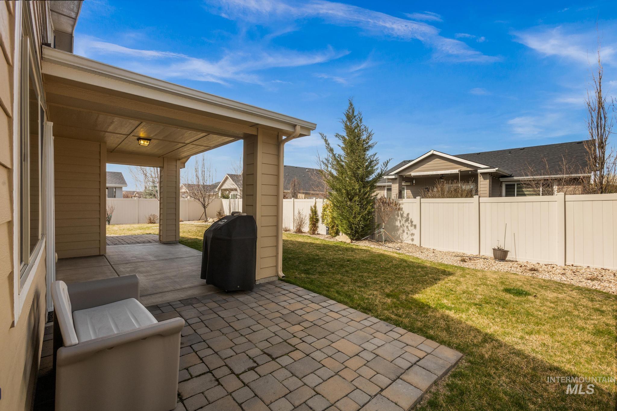 5832 West Rotherham Drive Eagle, ID 83616 - Photo 31 of 42 Fenced backyard featuring a patio and grilling area