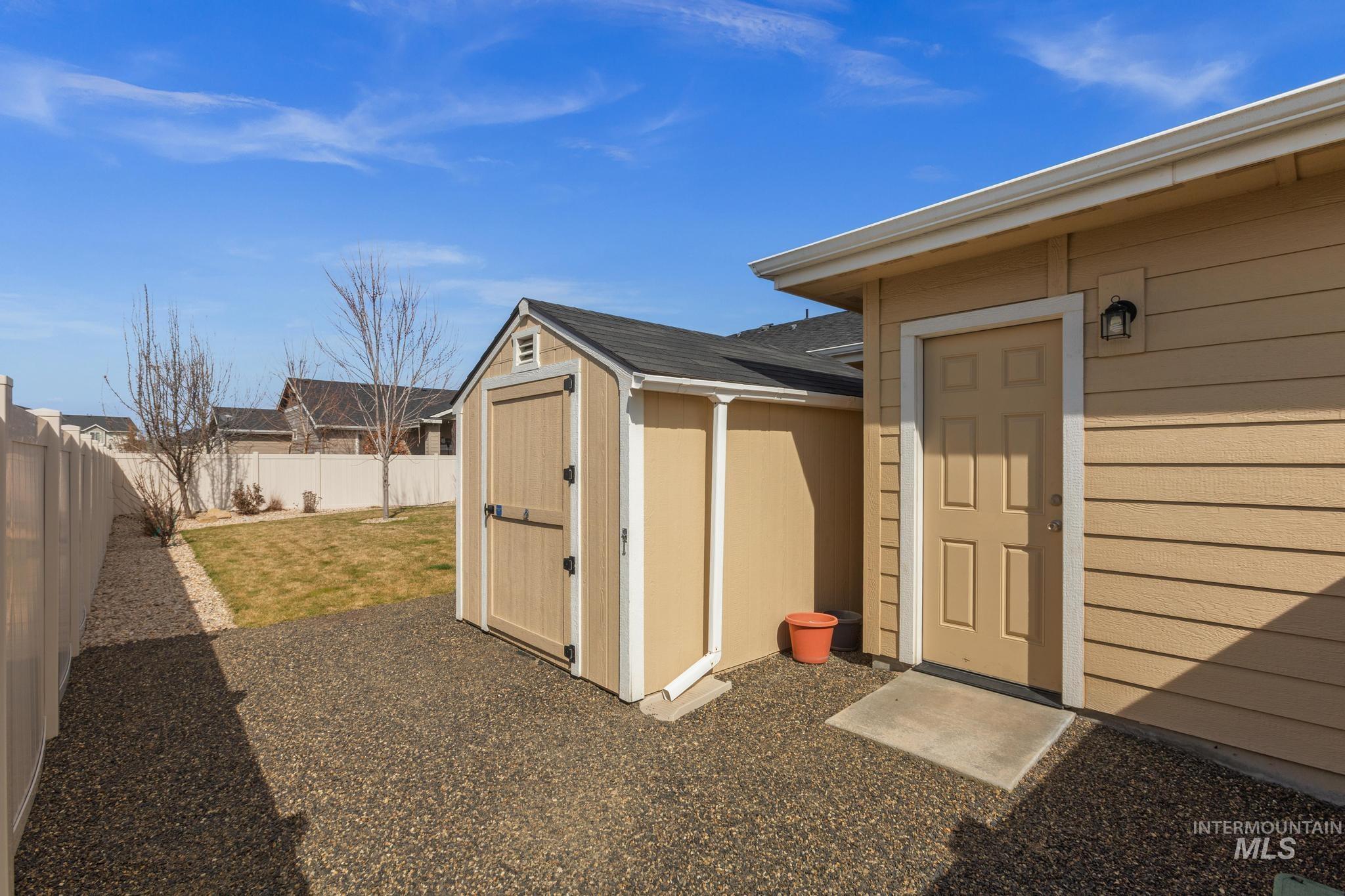 5832 West Rotherham Drive Eagle, ID 83616 - Photo 35 of 42 View of shed with a fenced backyard