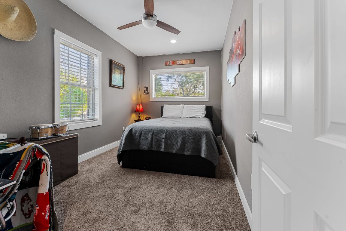 4204 Arthur Circle Leander, TX 78641 - Photo 25 of 40 a bedroom with a bed and a window