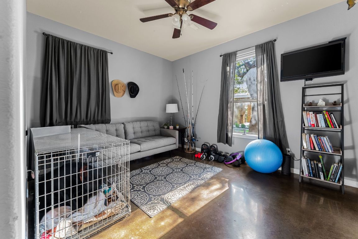 4204 Arthur Circle Leander, TX 78641 - Photo 28 of 40 a bedroom with furniture or window and a flat screen tv