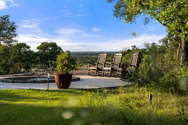 a view of swimming pool with outdoor seating