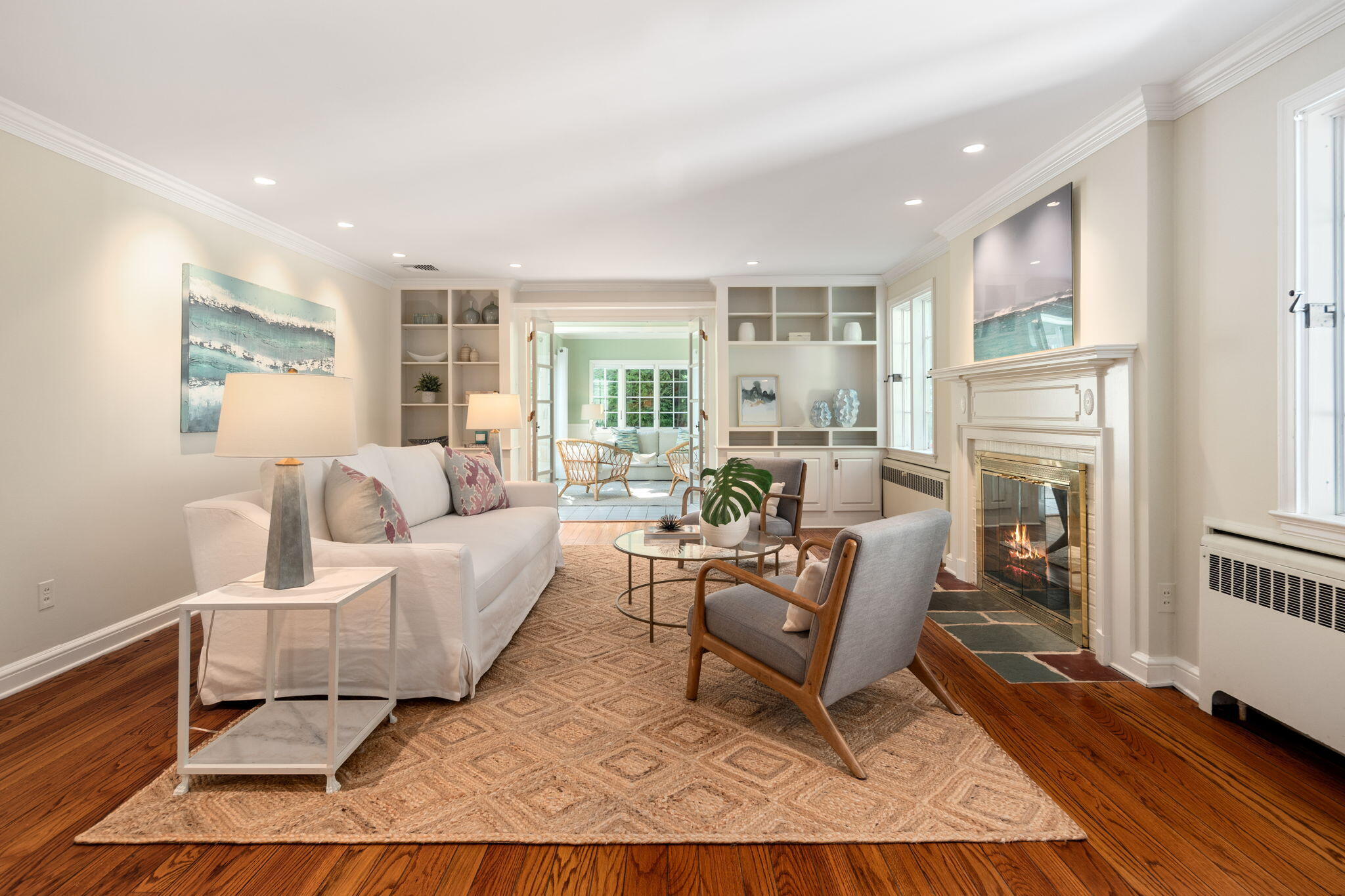 31 Crest Road Rowayton, CT 06853 - Photo 8 of 29 a living room with furniture and a fireplace
