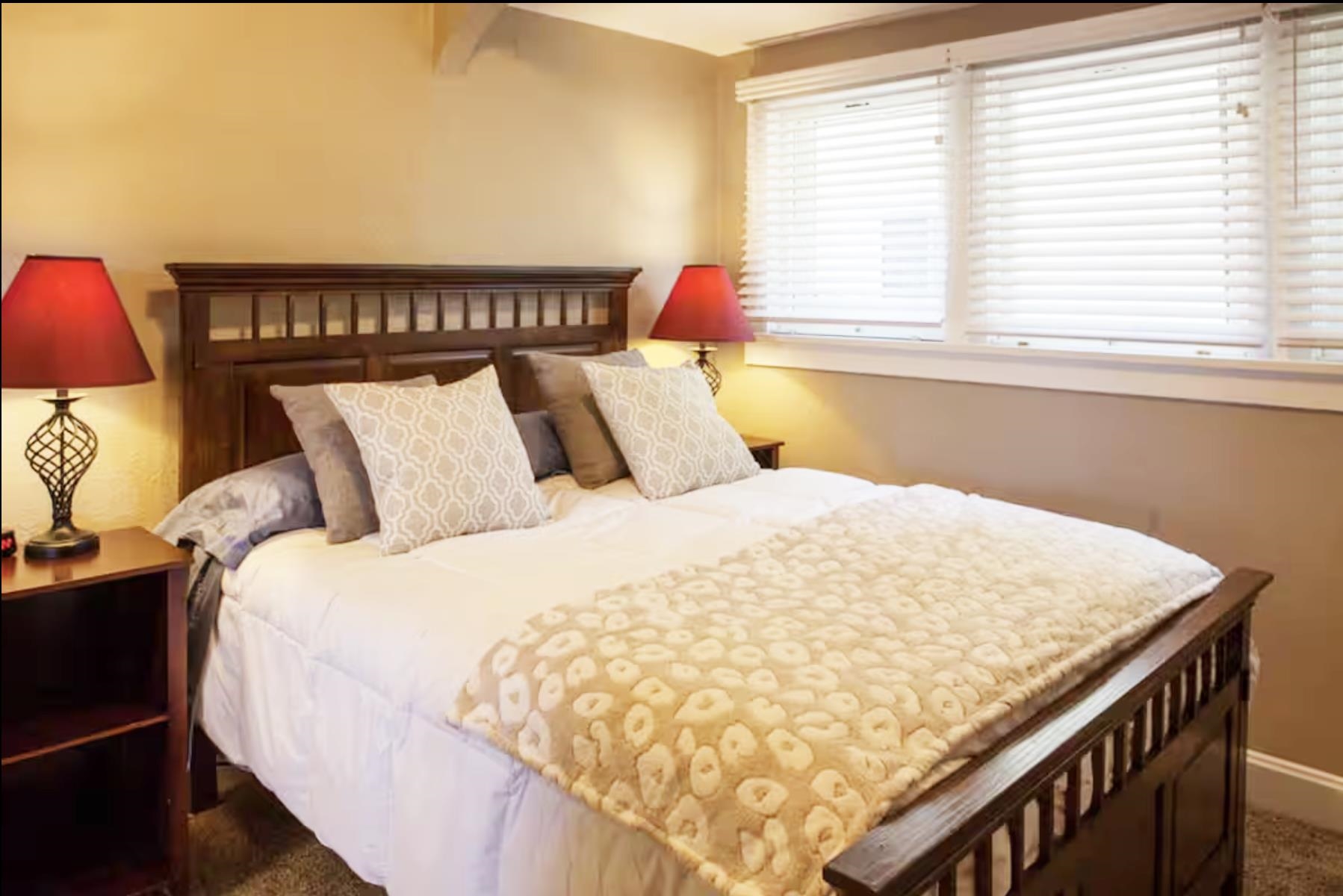 1460 Main Street Grand Junction, CO 81501 - Photo 11 of 31 a bedroom with a bed and window