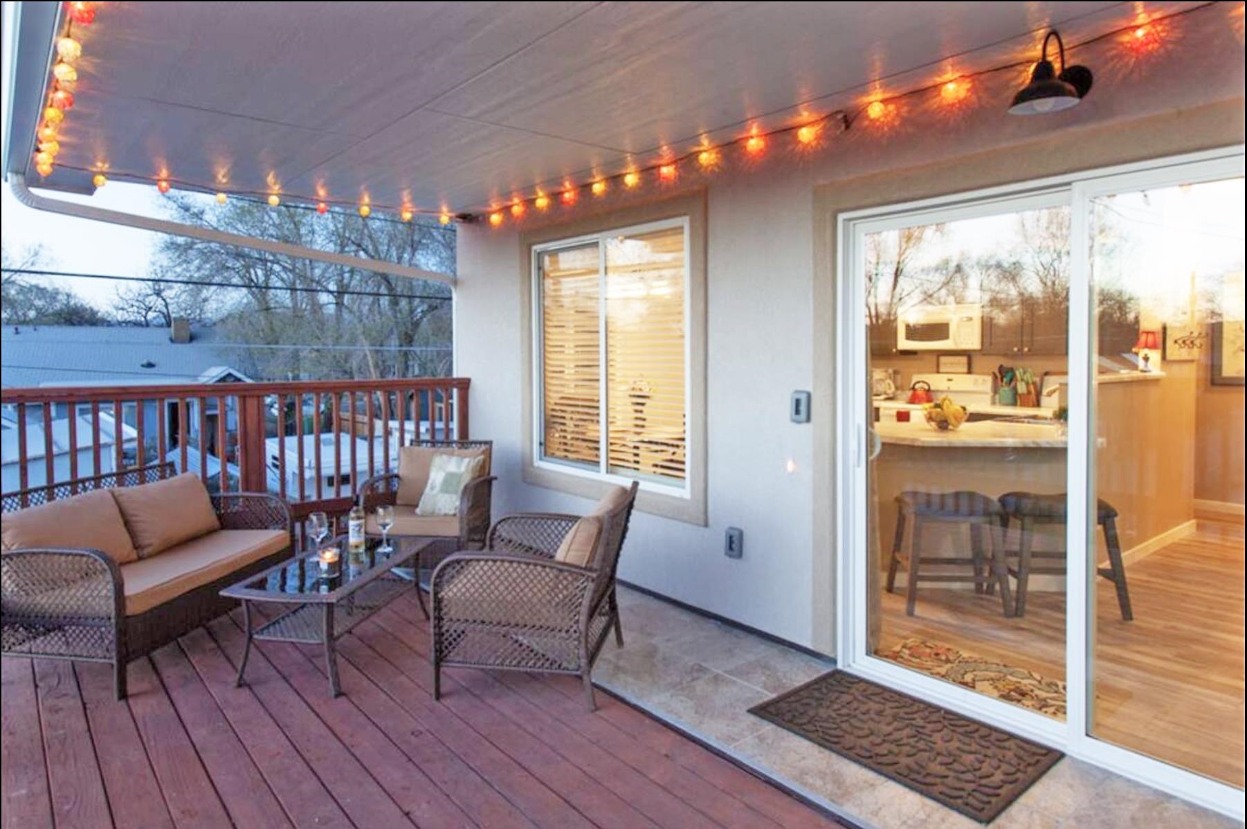1460 Main Street Grand Junction, CO 81501 - Photo 25 of 31 a balcony with furniture and a potted plant