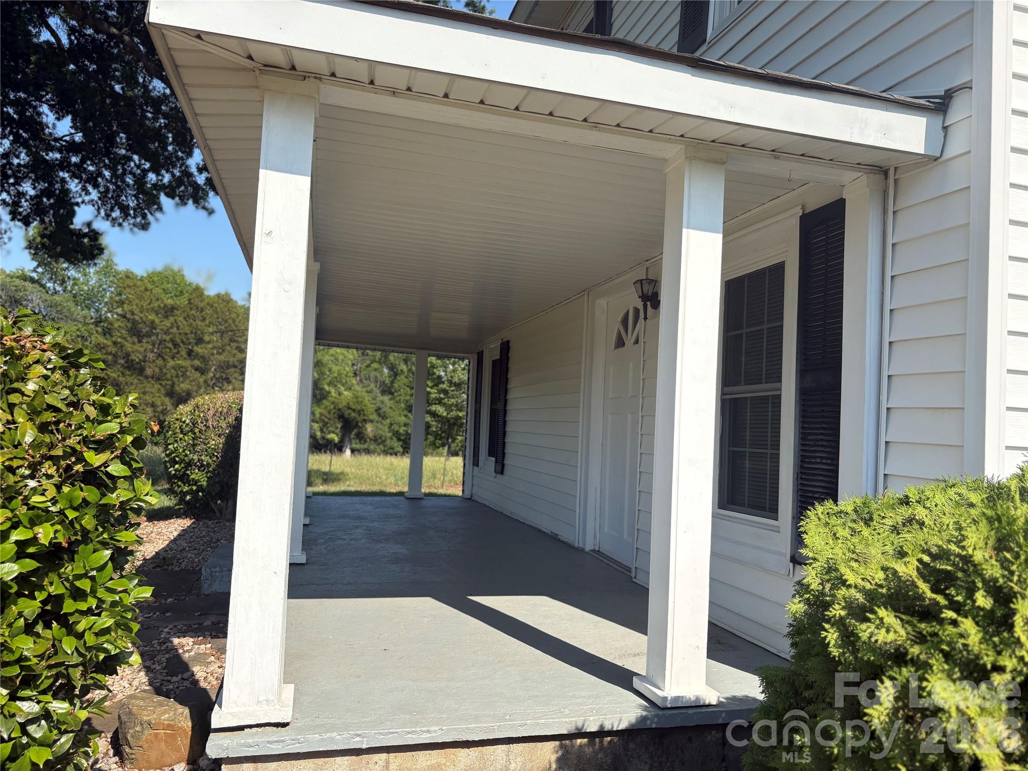 6625 Long Road Matthews, NC 28104 - Photo 3 of 21 a view of a porch