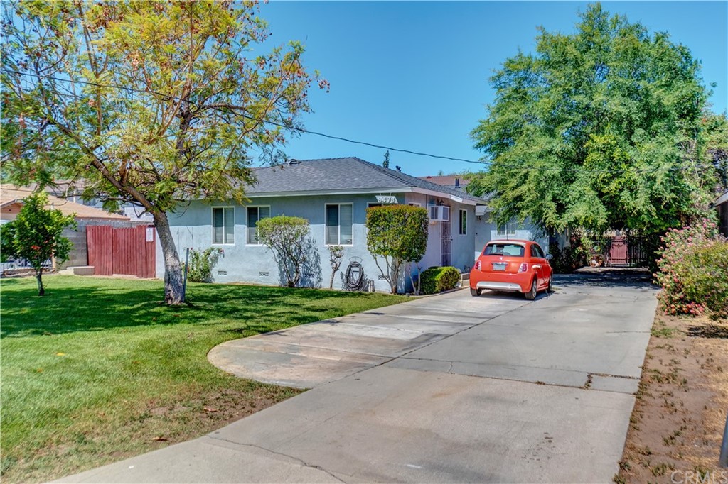 9471 Garfield Street Riverside, CA 92503 - Photo 1 of 1 a house view with a garden space