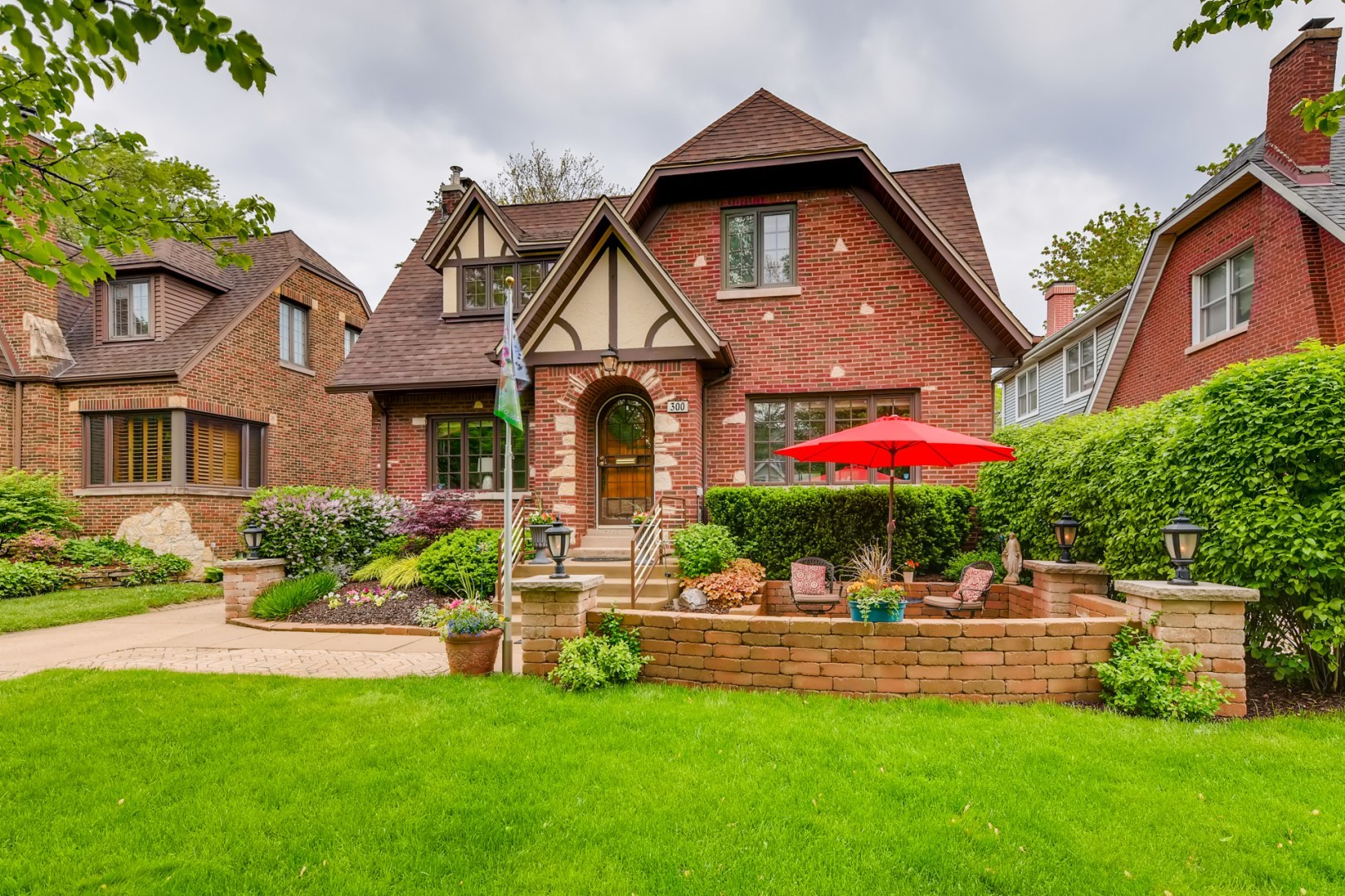 300 Blythe Road Riverside, IL 60546 - Photo 1 of 31 a front view of house with yard and green space