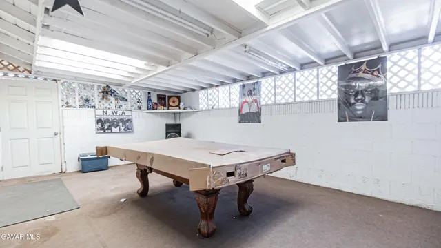 a room with furniture and window