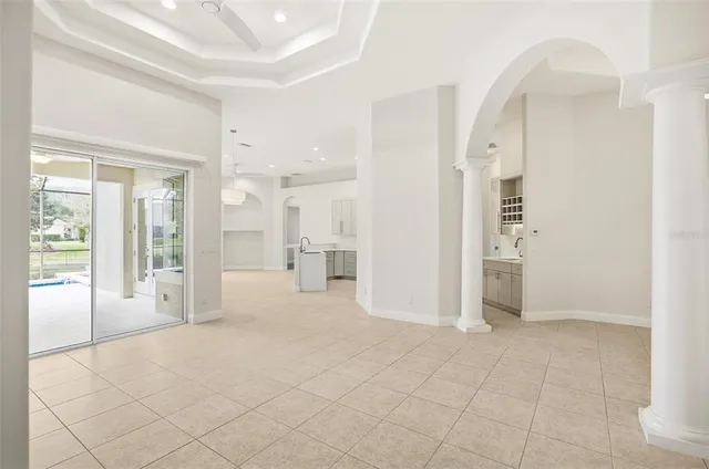 a kitchen with stainless steel appliances a refrigerator and cabinets
