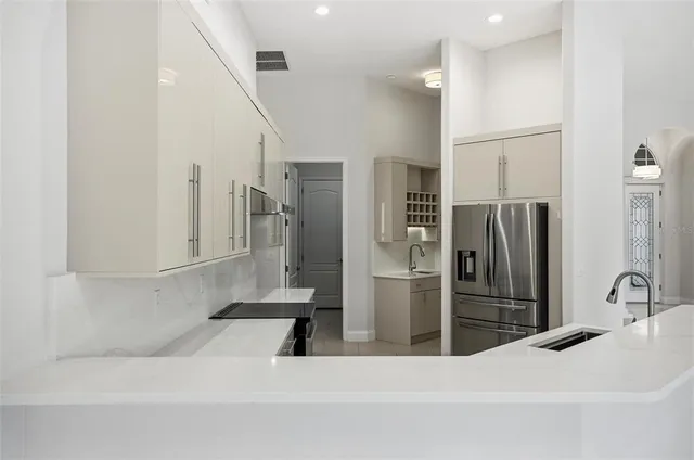 a white bath tub sitting in a bathroom