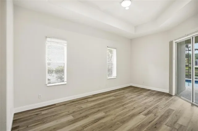 a bathroom with a tub and shower