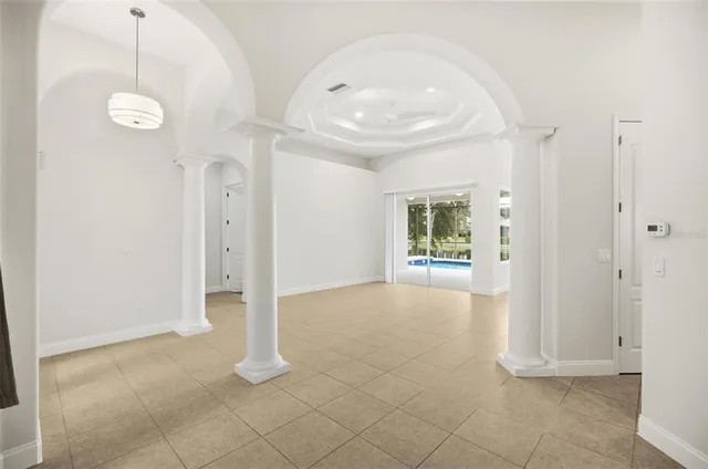 a kitchen with a sink and large window
