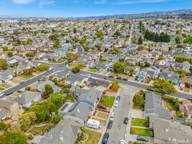 an aerial view of residential building with outdoor space