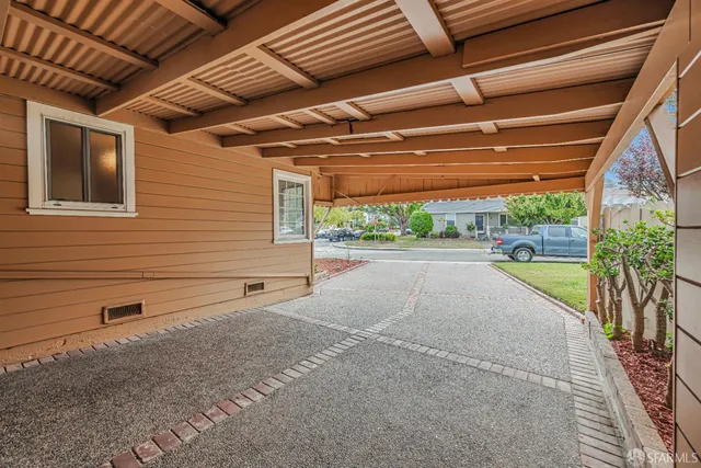 a view of a backyard of a house