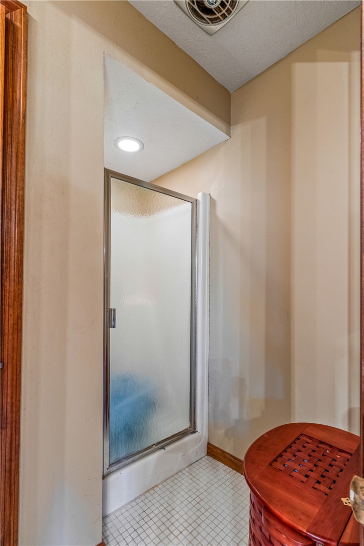 610 West Alex Bell Road Dayton, OH 45459 - Photo 19 of 36 Bright and functional bathroom with tiled flooring.