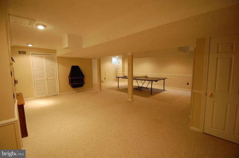 1904 Ednor Road Silver Spring, MD 20905 - Photo 20 of 30 a view of a room with gym equipment