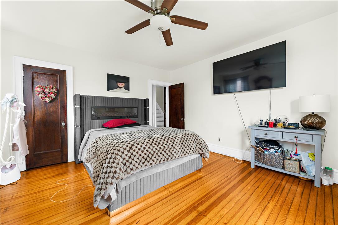 2055 Ferry Street Wilson, PA 18042 - Photo 10 of 21 This spacious room features gleaming hardwood floors and a comforting ceiling fan.