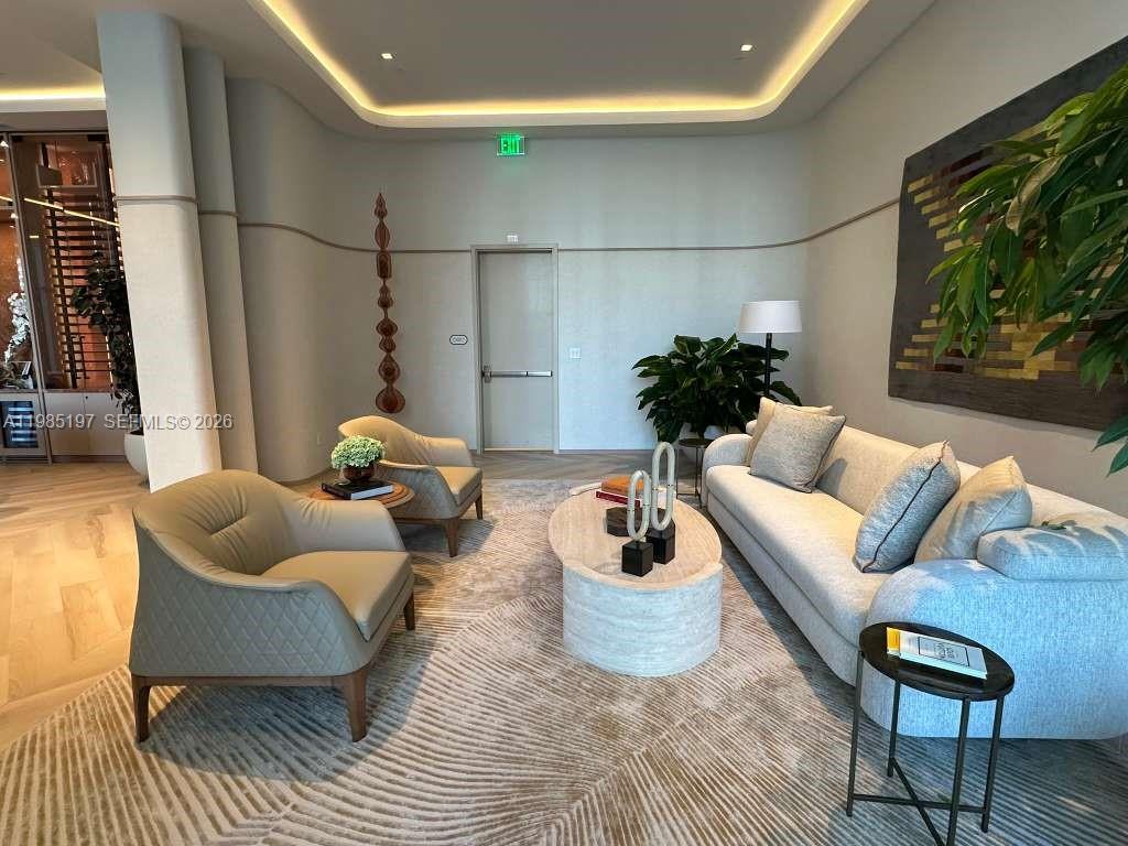 77 Southeast 5th Street, Unit 1513 Miami, FL 33131 - Photo 30 of 49 a living room with furniture