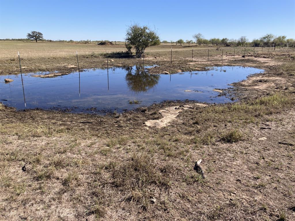 0 Medlan Chapel Road Graham, TX 76450 - Photo 6 of 25 a view of a yard next to a building