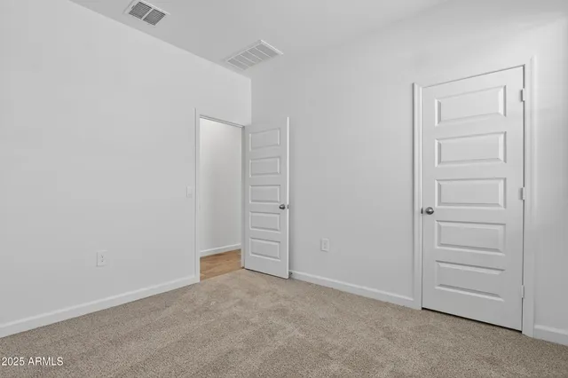 an empty room with closet