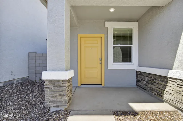 a room with a couch and a window