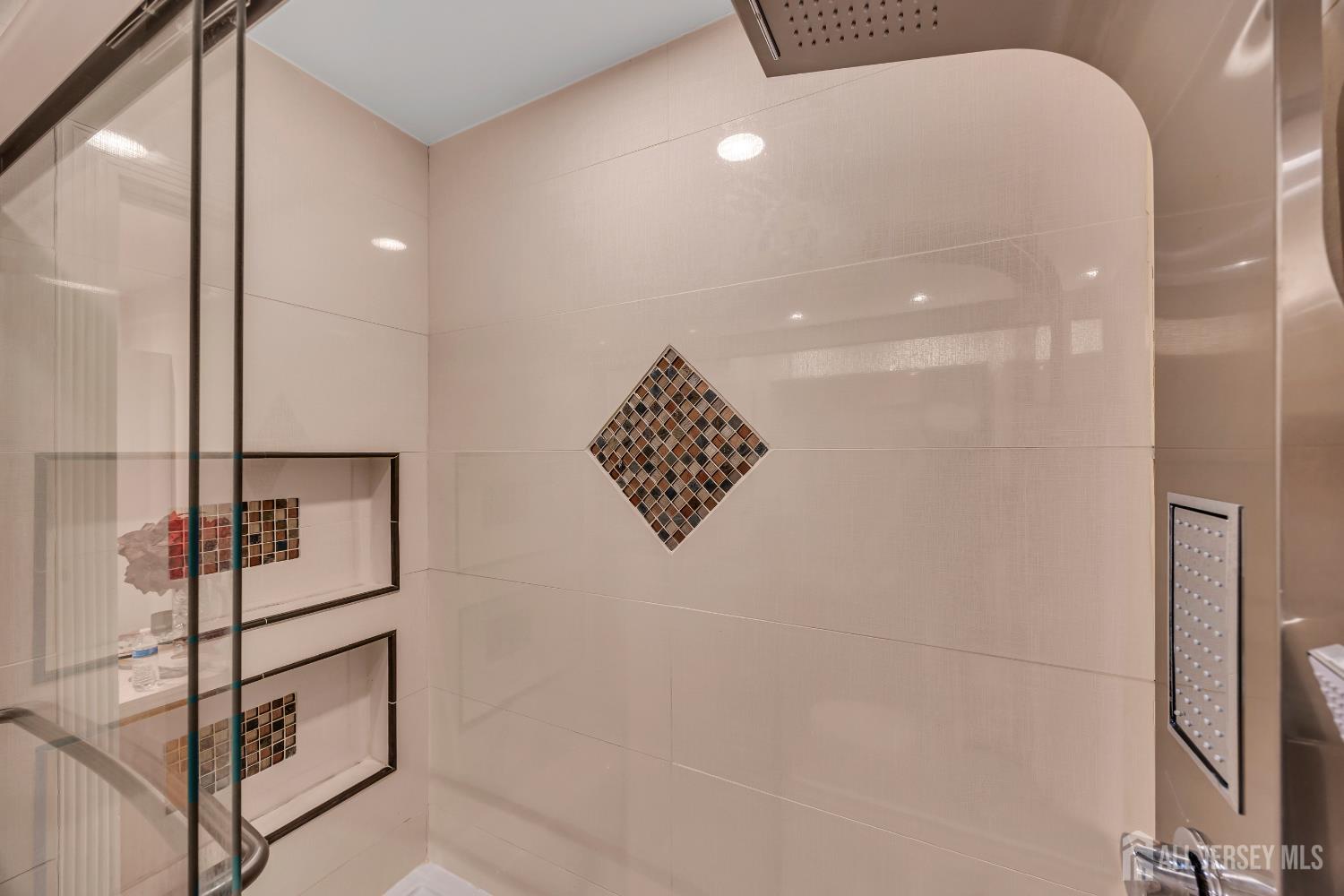 152 Redpine Loop Old Bridge, NJ 08857 - Photo 15 of 27 a bathroom with a sink and a mirror