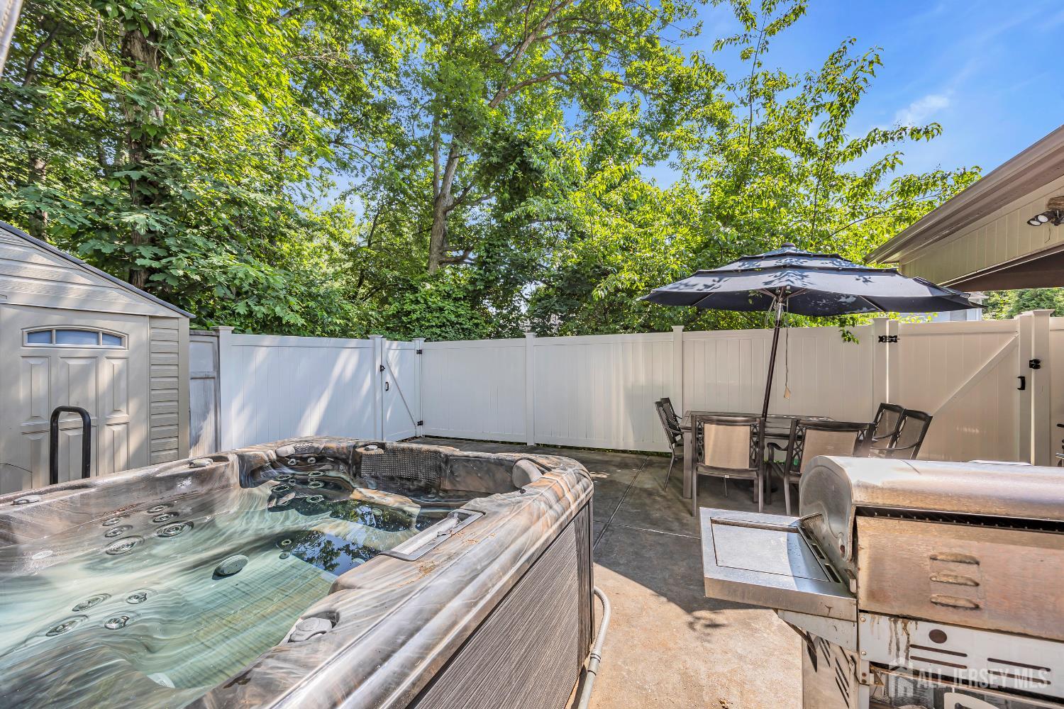 152 Redpine Loop Old Bridge, NJ 08857 - Photo 23 of 27 an outdoor sitting area with furniture