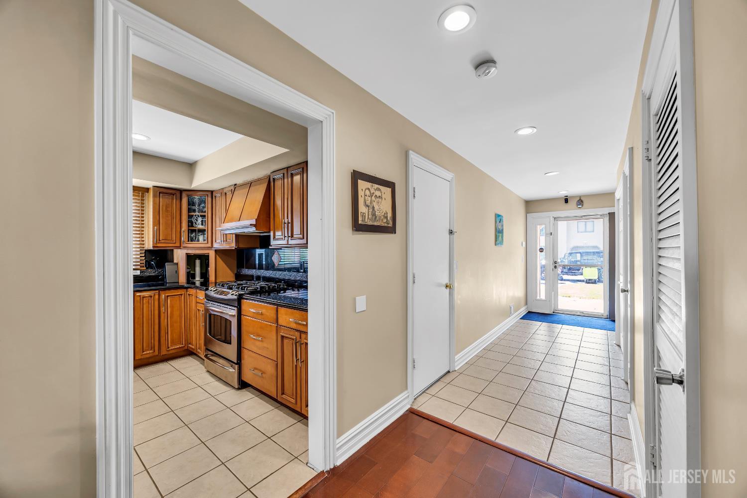 152 Redpine Loop Old Bridge, NJ 08857 - Photo 8 of 27 a view of a kitchen with furniture and an empty room
