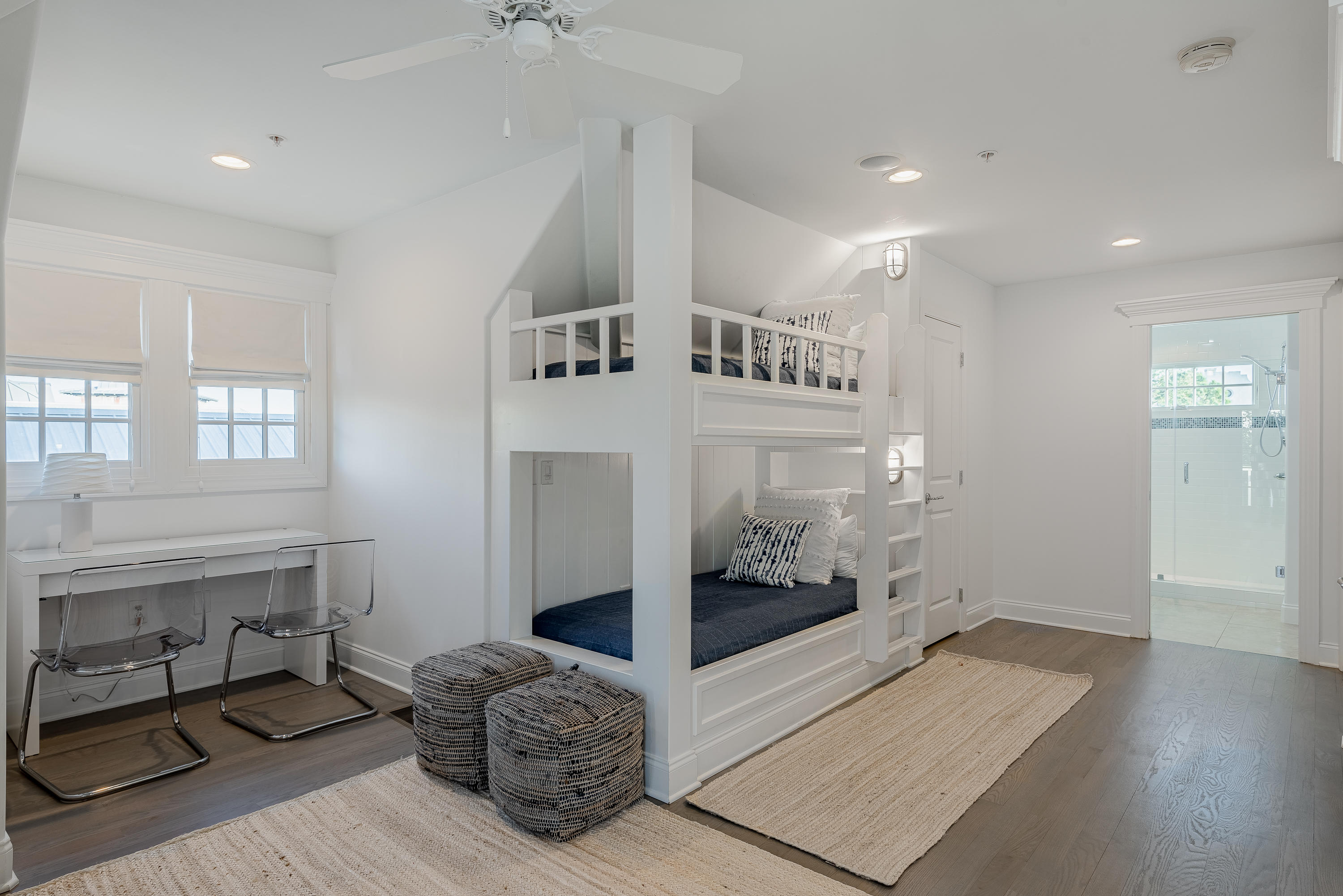 59 West Water Street Inlet Beach, FL 32461 - Photo 17 of 45 a spacious bedroom with a bed and a window