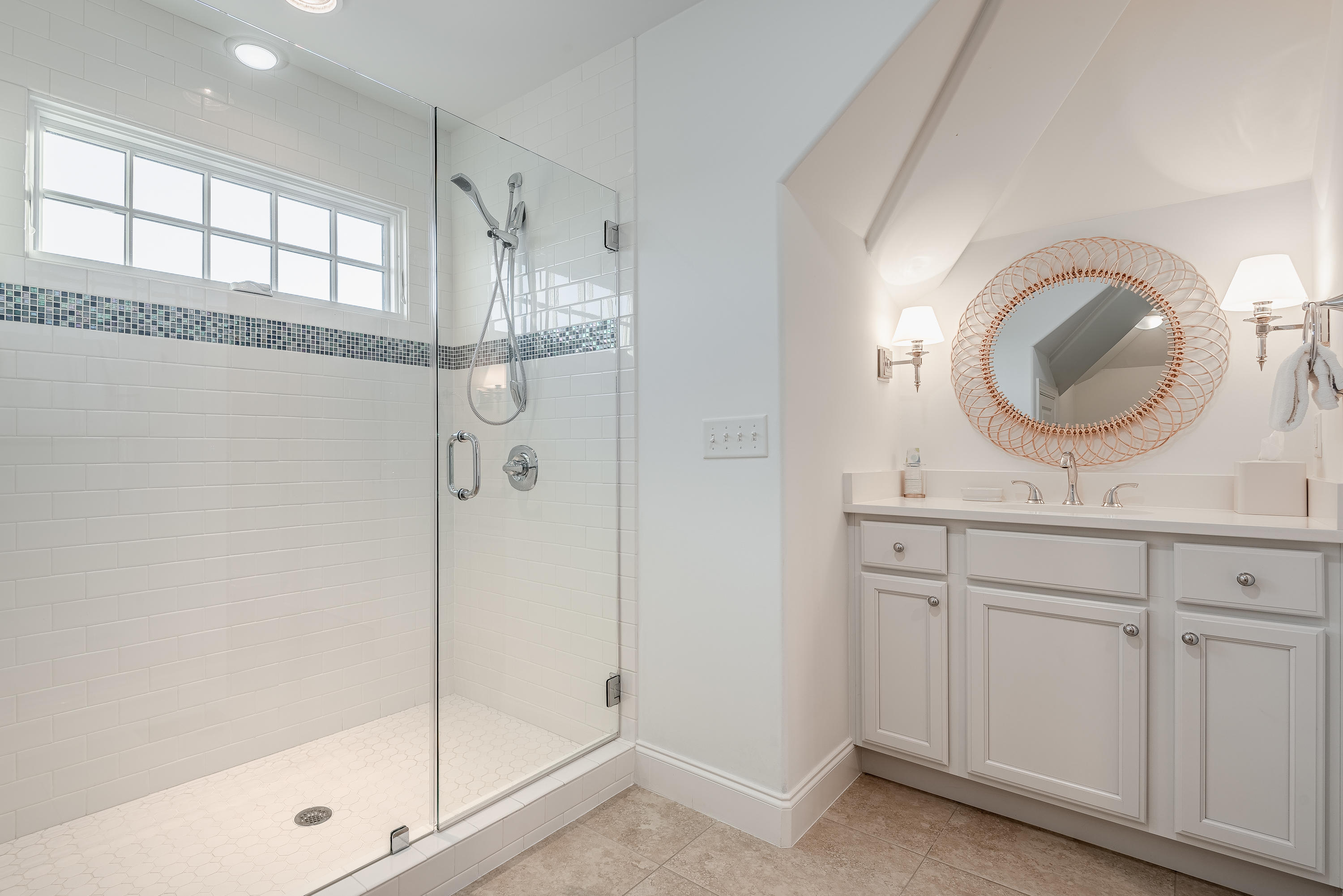 59 West Water Street Inlet Beach, FL 32461 - Photo 20 of 45 a bathroom with a sink a mirror a glass door and shower