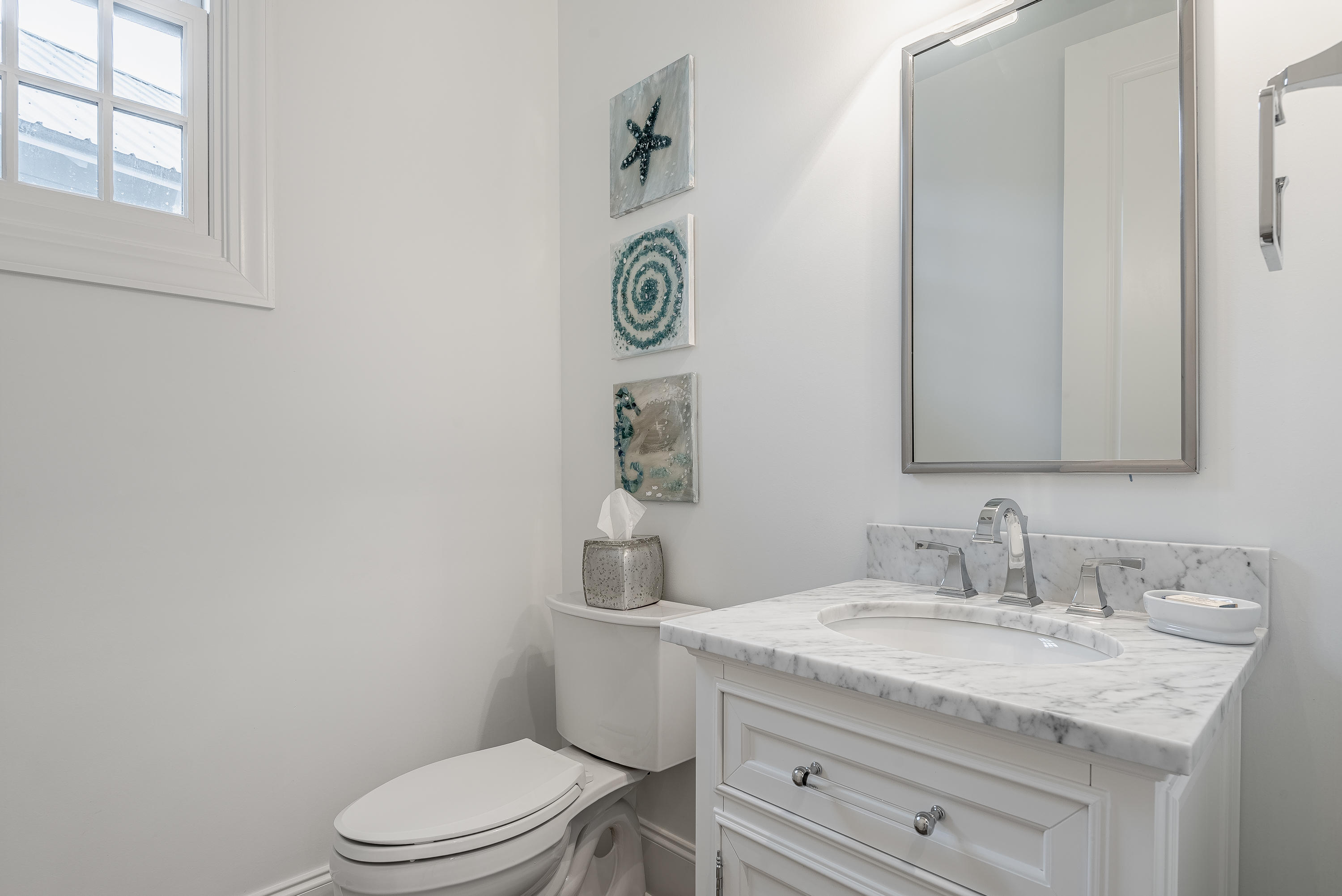 59 West Water Street Inlet Beach, FL 32461 - Photo 21 of 45 a bathroom with a granite countertop toilet sink and mirror
