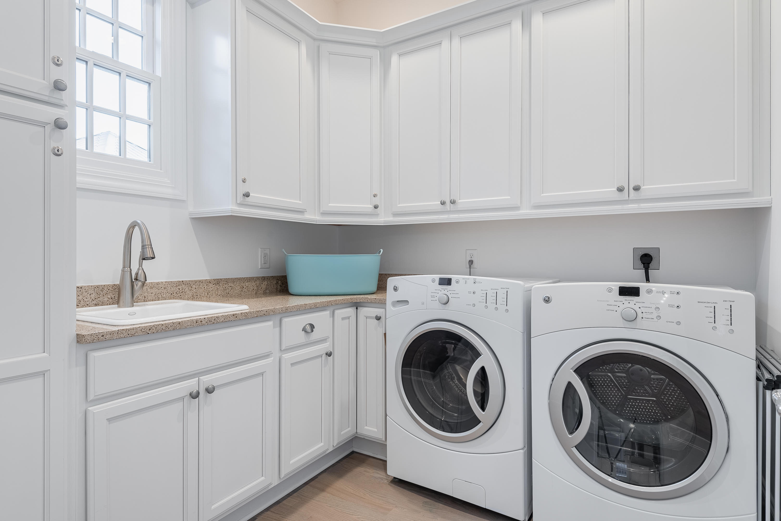 59 West Water Street Inlet Beach, FL 32461 - Photo 22 of 45 a utility room with sink dryer and washer