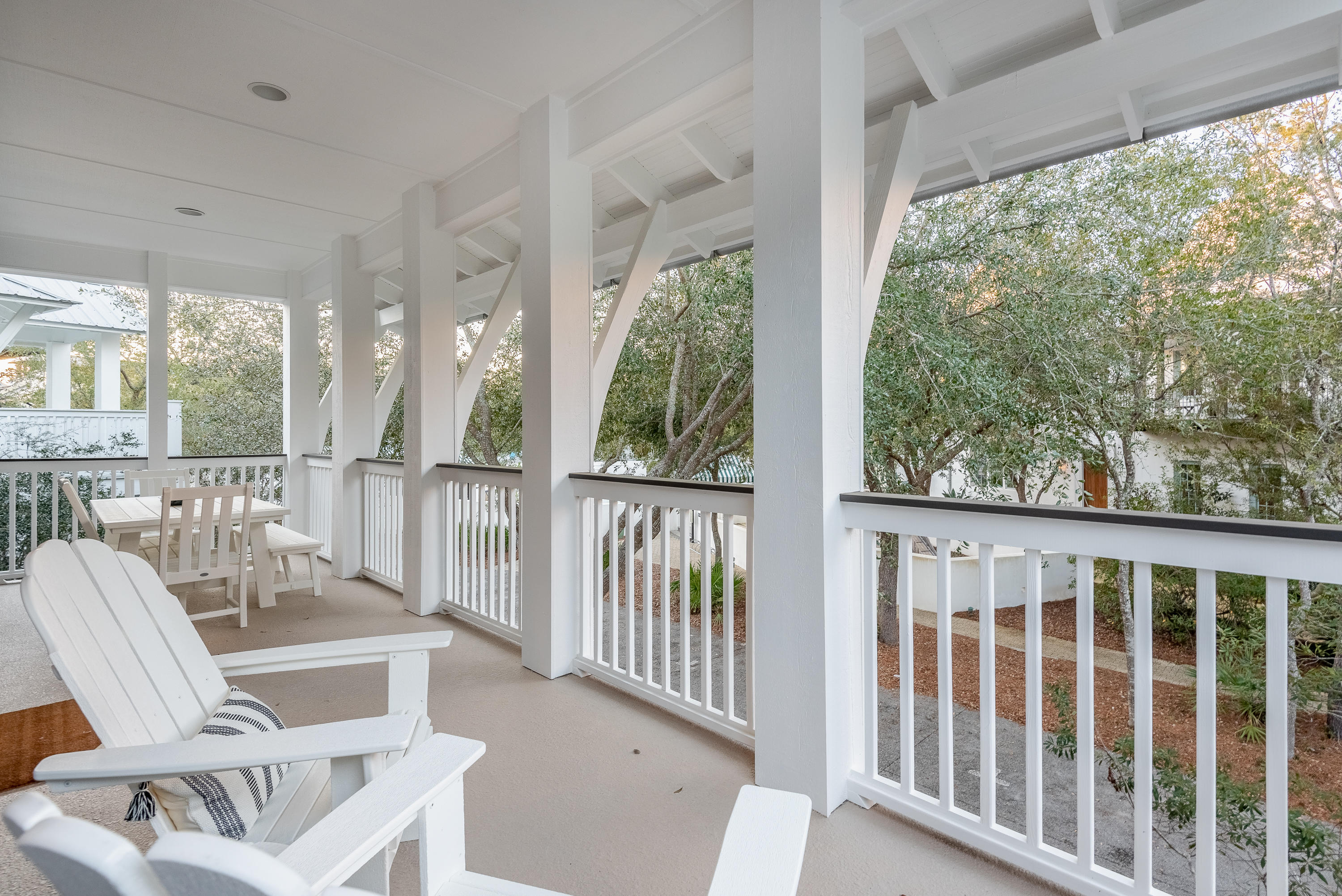 59 West Water Street Inlet Beach, FL 32461 - Photo 23 of 45 a view of a chair and table in balcony