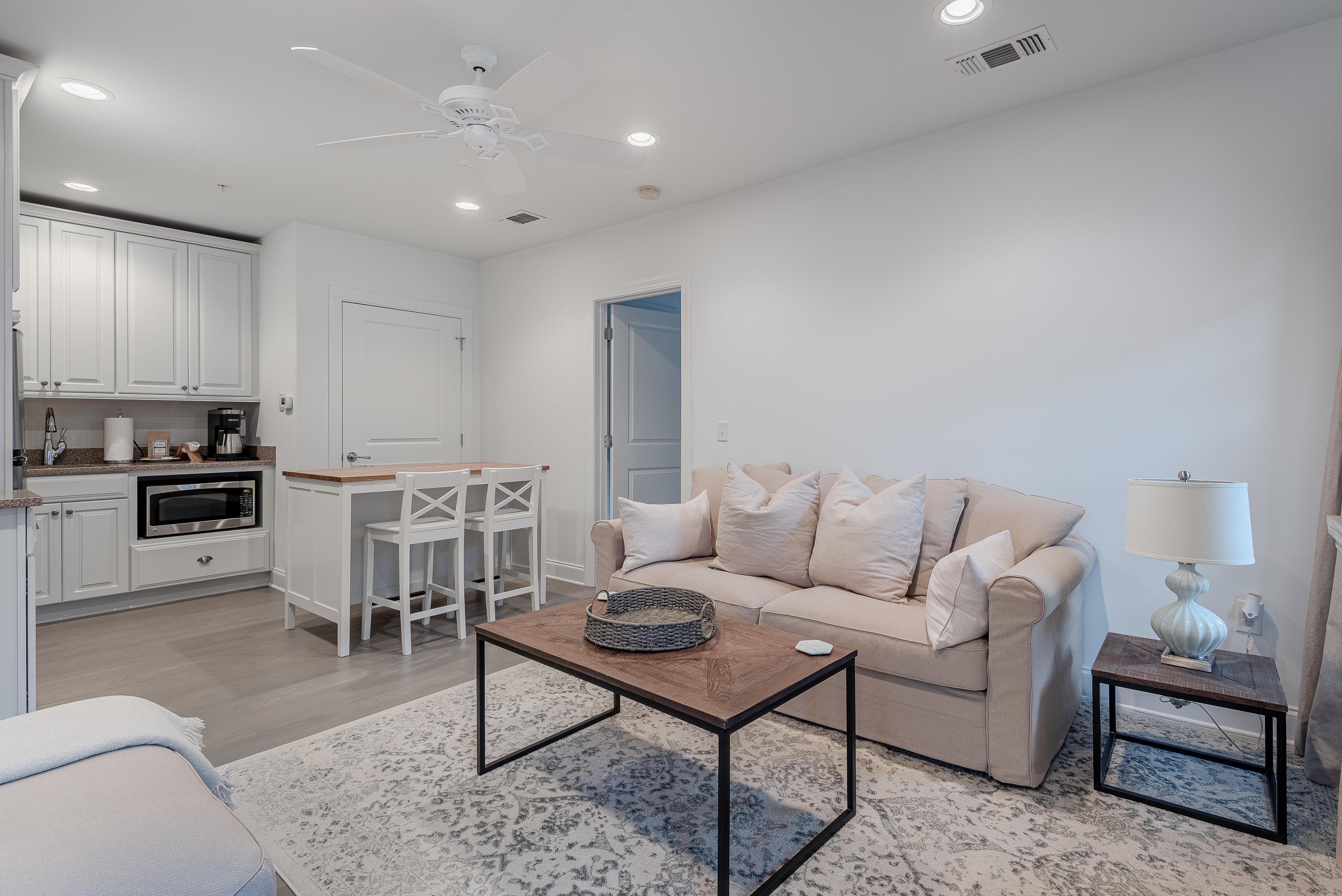 59 West Water Street Inlet Beach, FL 32461 - Photo 28 of 45 a living room with furniture and kitchen view