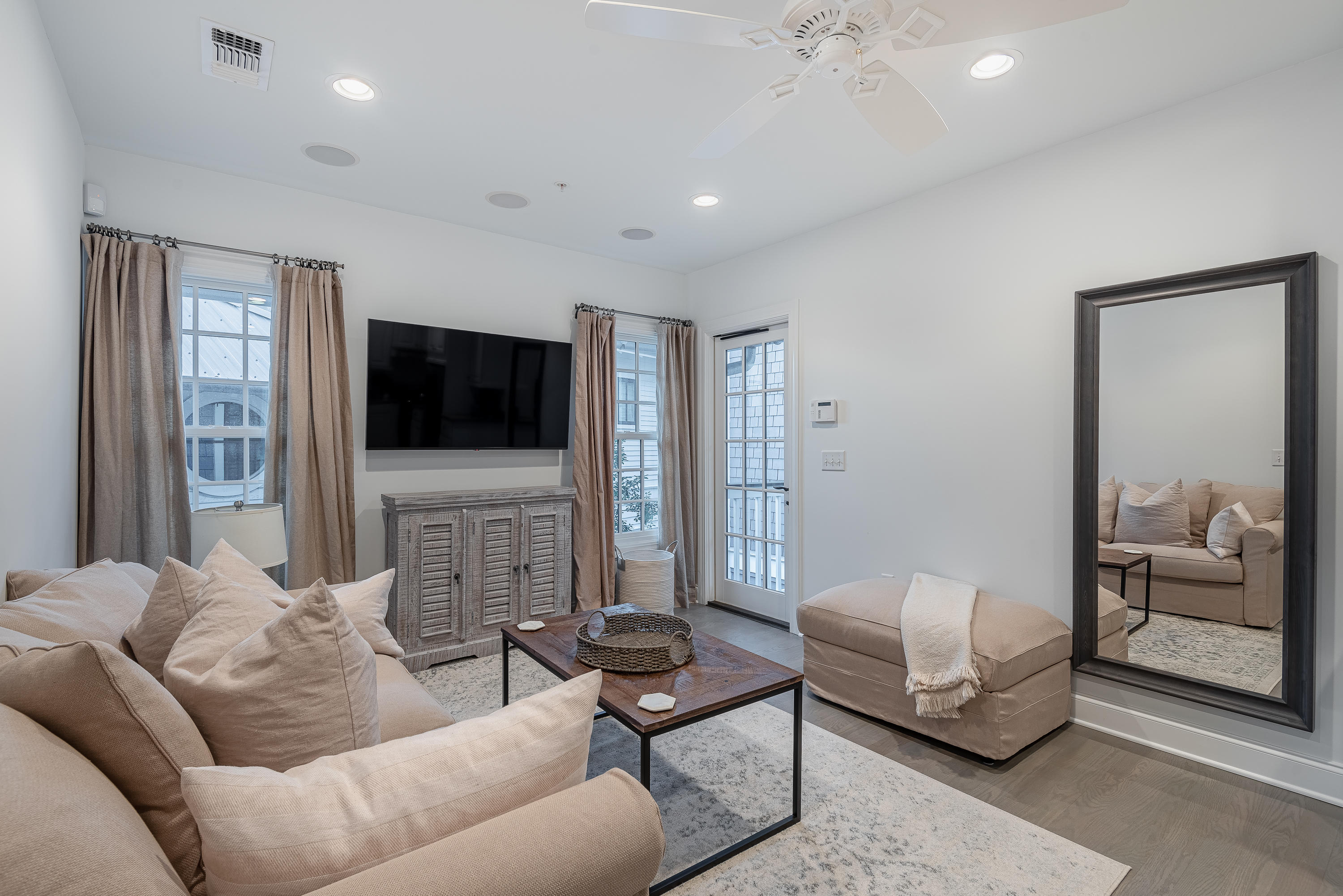 59 West Water Street Inlet Beach, FL 32461 - Photo 30 of 45 a living room with furniture and a flat screen tv