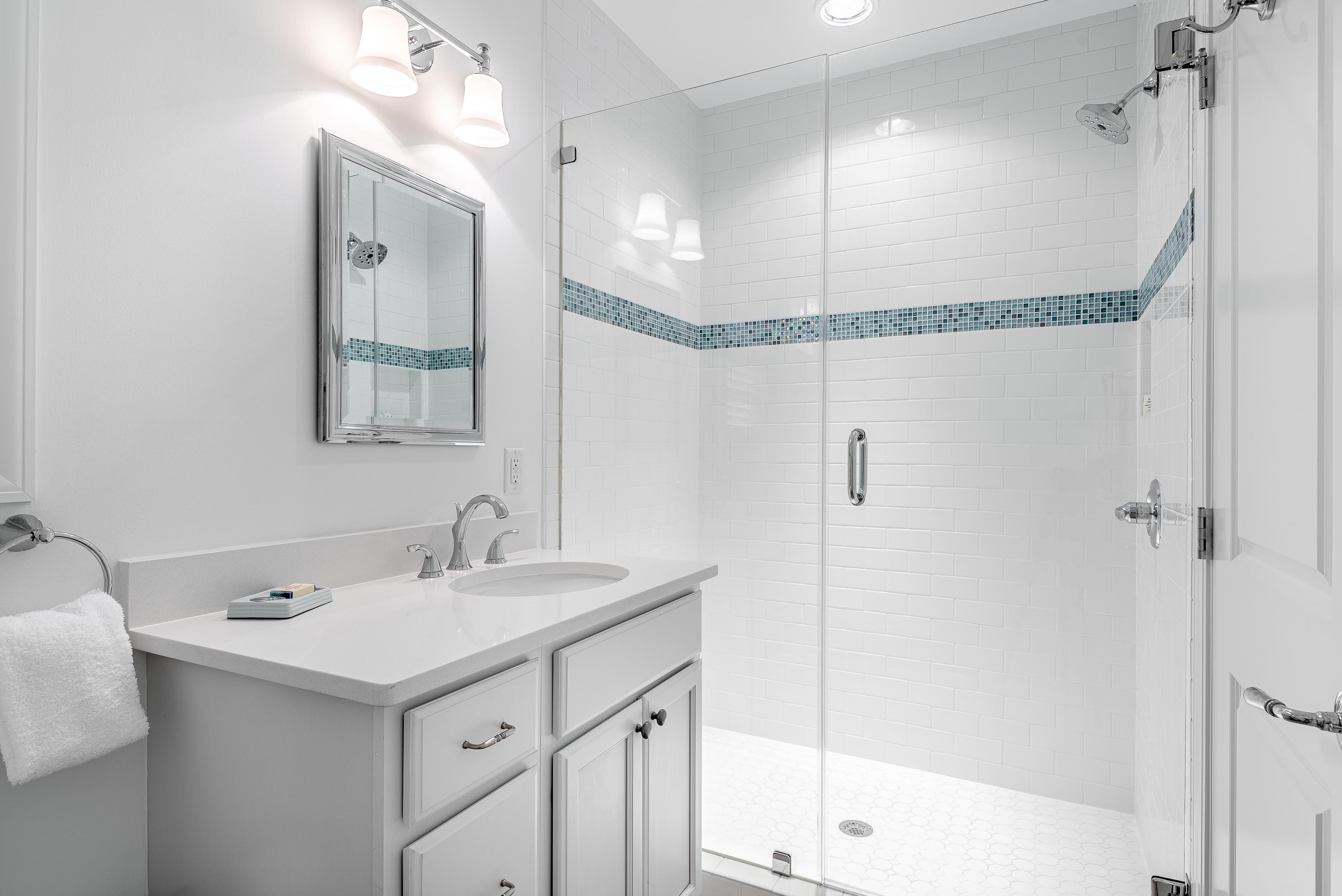 59 West Water Street Inlet Beach, FL 32461 - Photo 31 of 45 a bathroom with a sink mirror and a shower