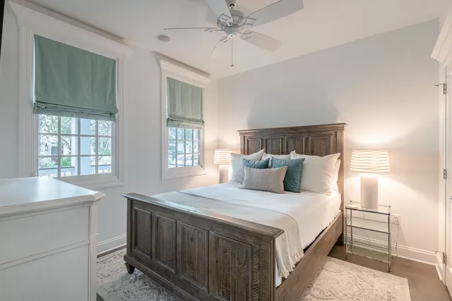 a bedroom with a bed and a sink