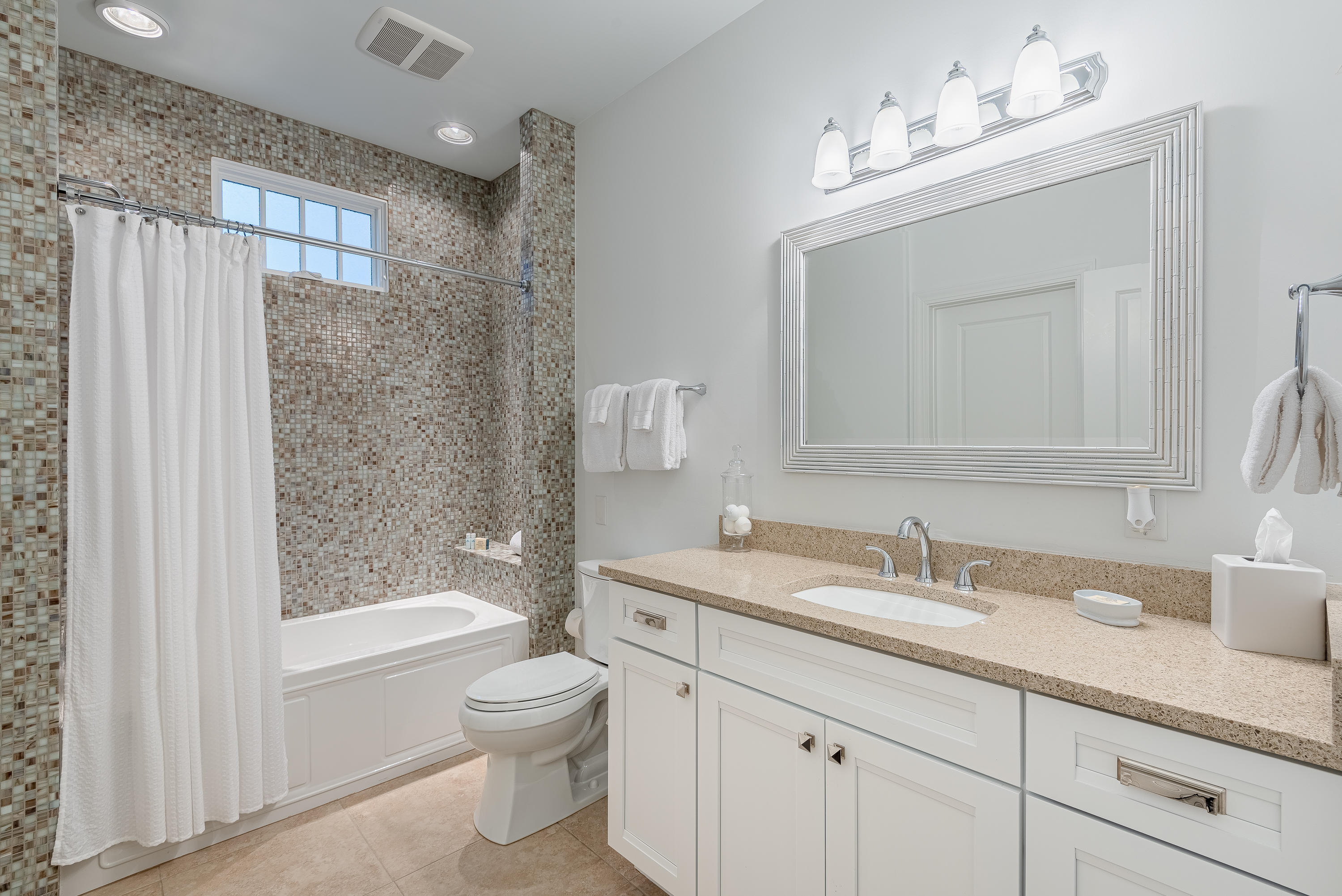 59 West Water Street Inlet Beach, FL 32461 - Photo 7 of 45 a bathroom with a sink a toilet and shower