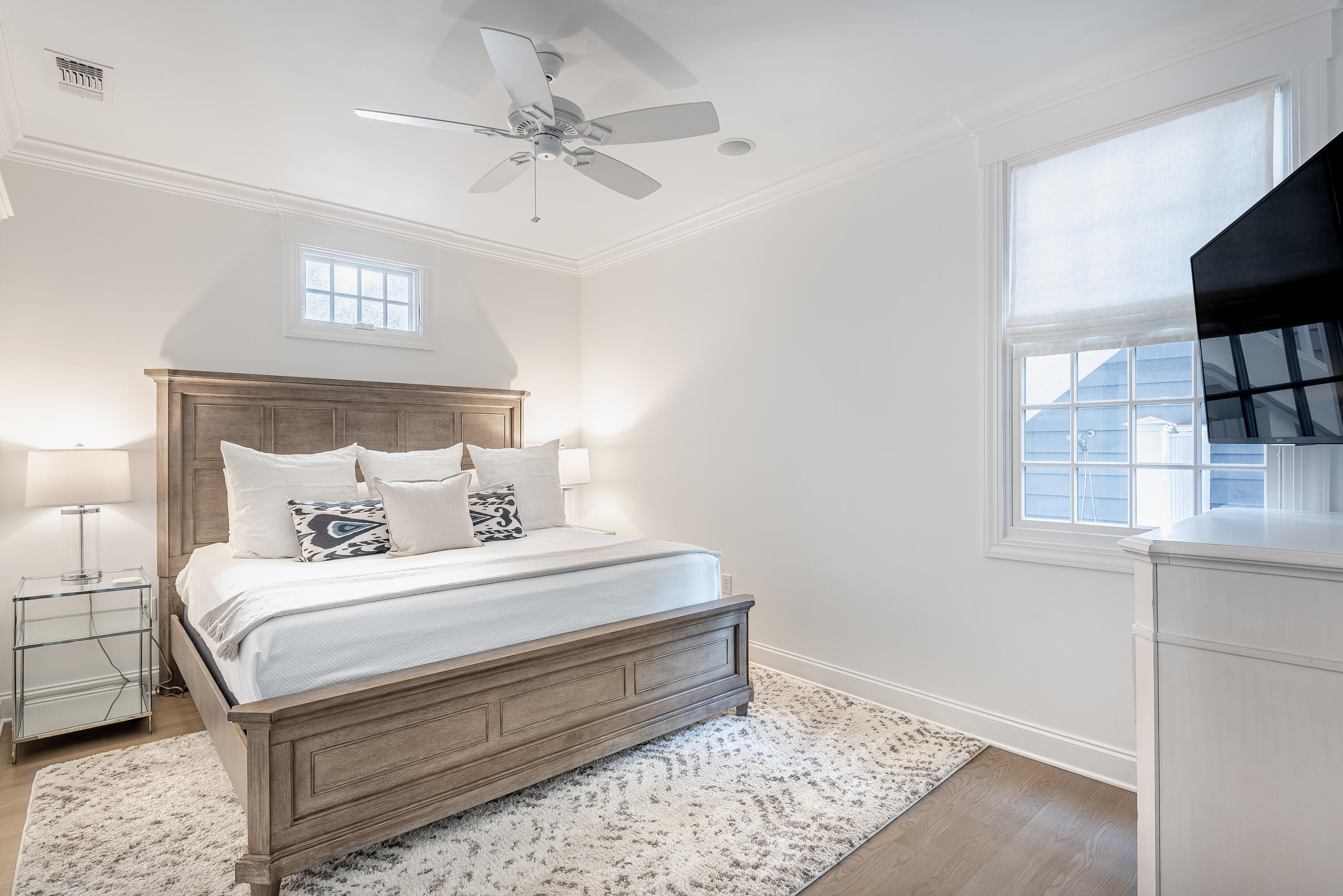 59 West Water Street Inlet Beach, FL 32461 - Photo 8 of 45 a bedroom with a bed and a window