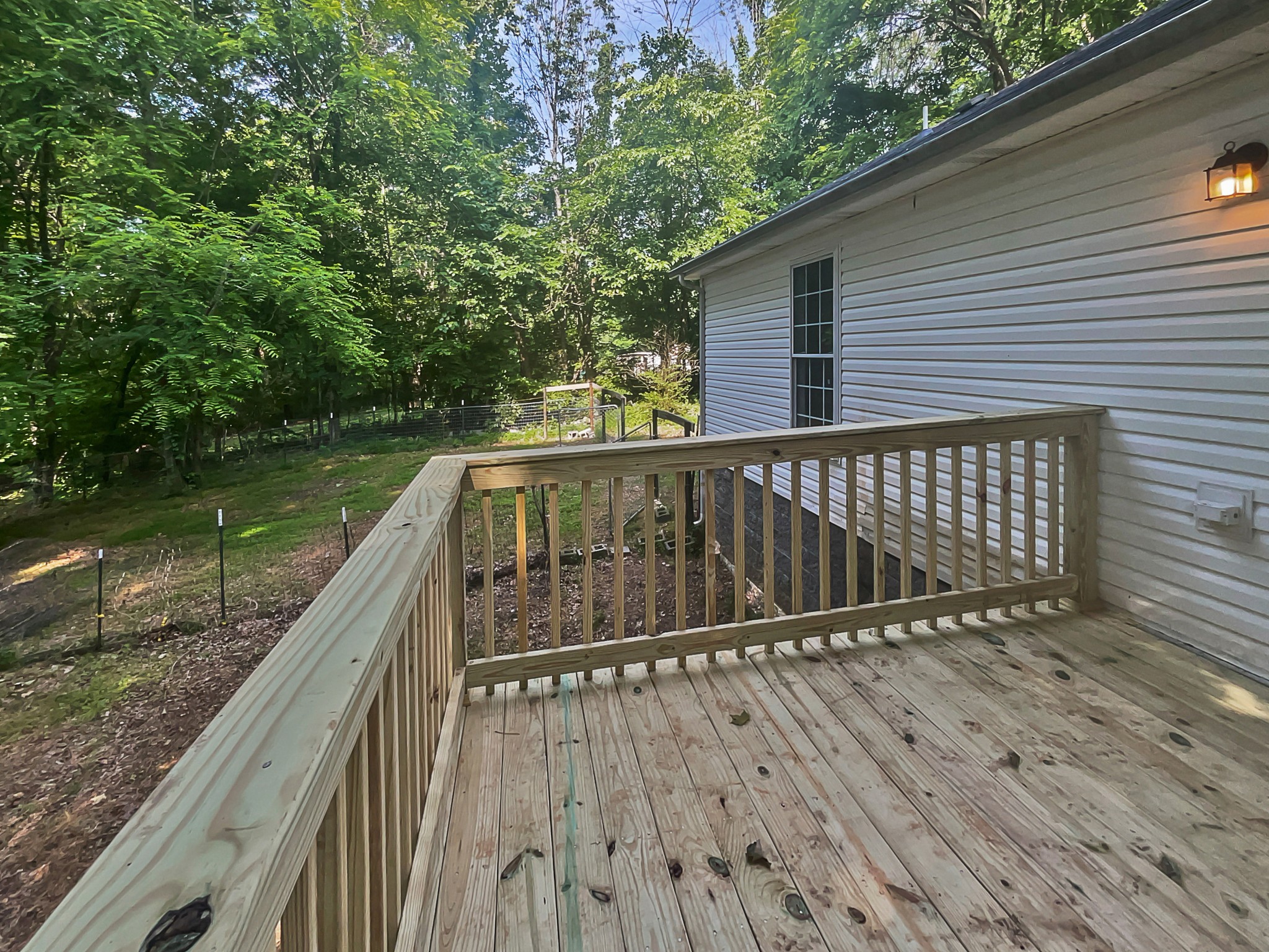 108 Nancy Avenue Pleasant View, TN 37146 - Photo 17 of 20 a balcony with wooden floor