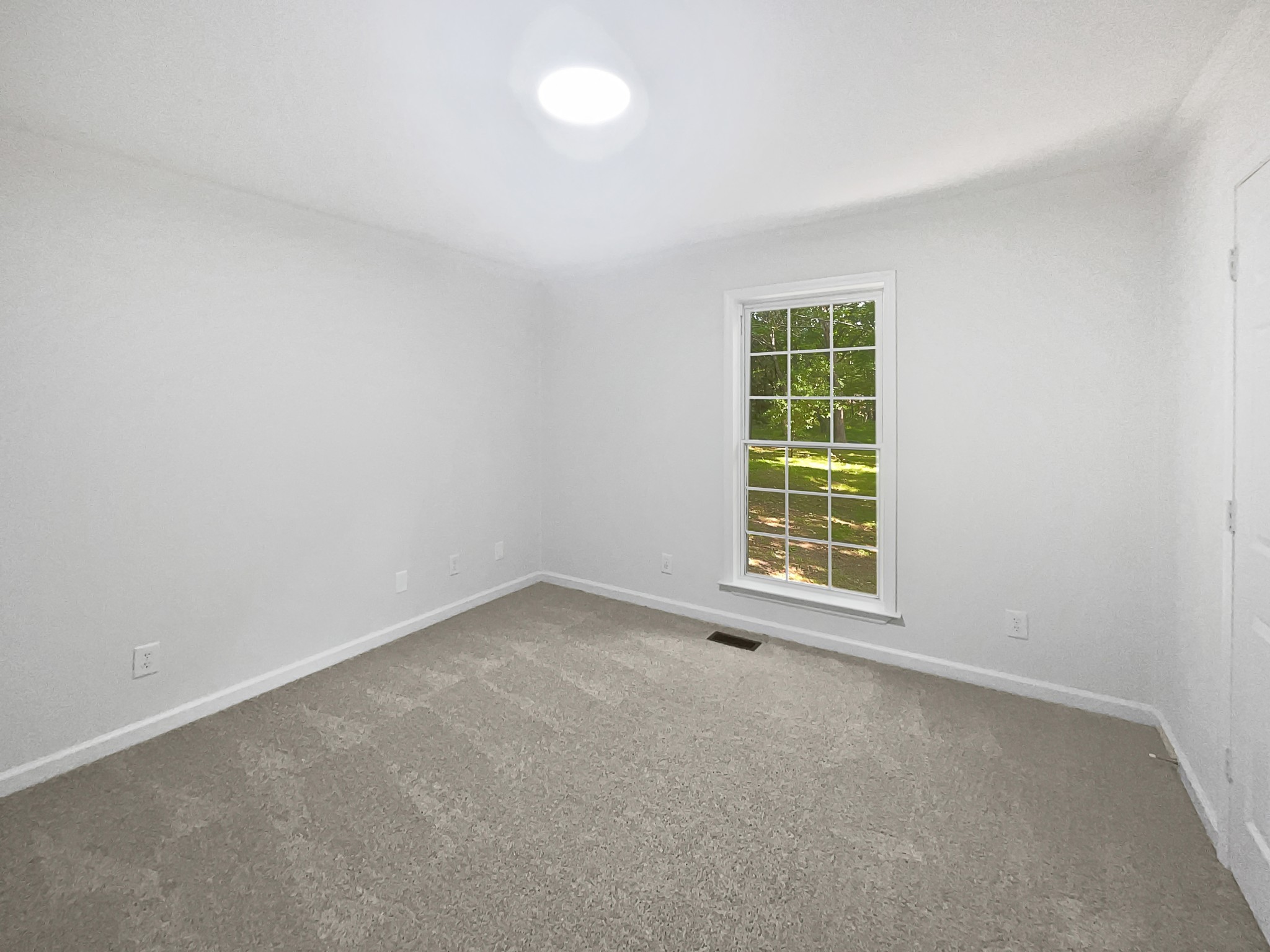 108 Nancy Avenue Pleasant View, TN 37146 - Photo 5 of 20 an empty room with a window