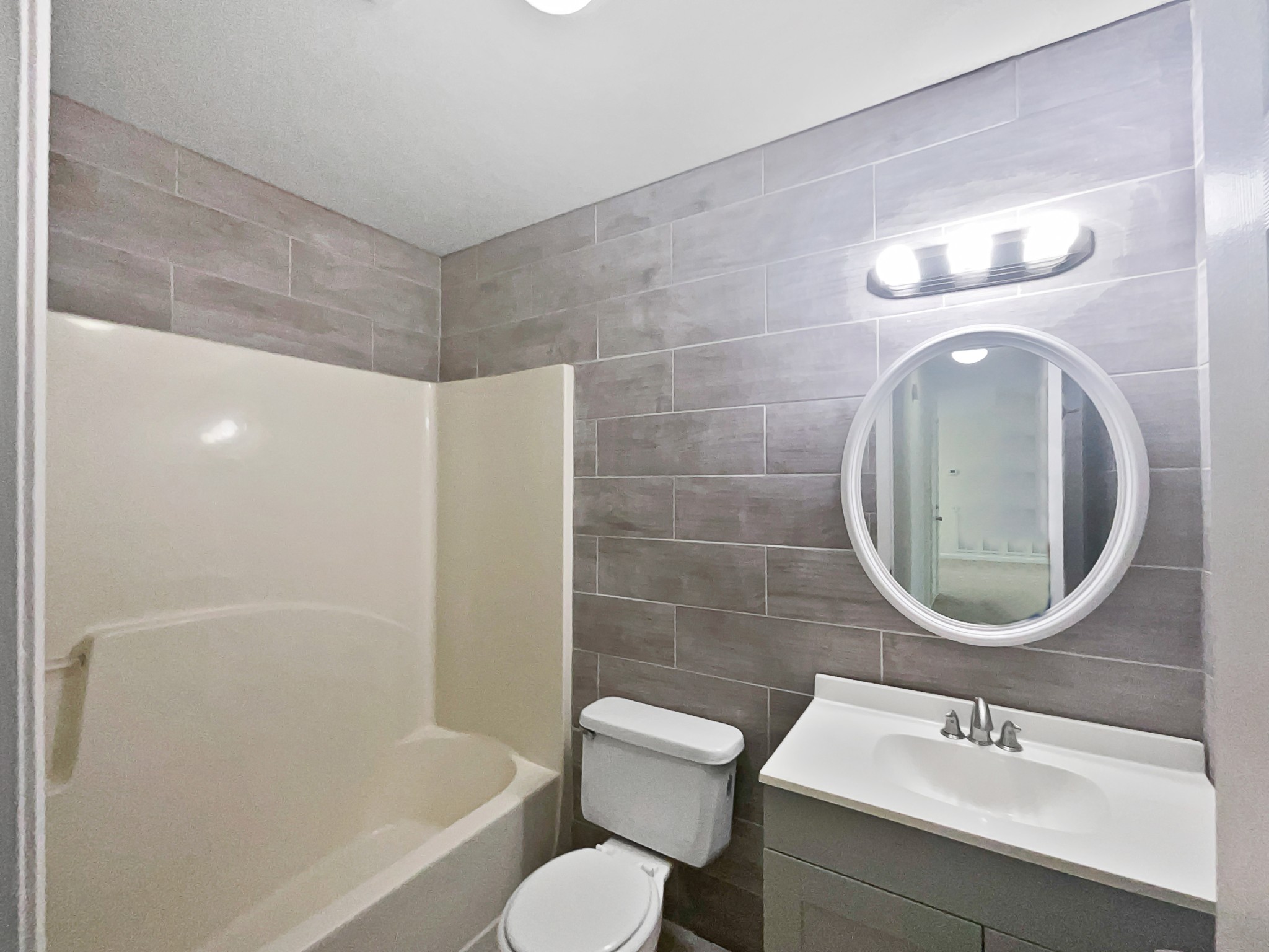 108 Nancy Avenue Pleasant View, TN 37146 - Photo 7 of 20 a bathroom with a toilet sink and mirror