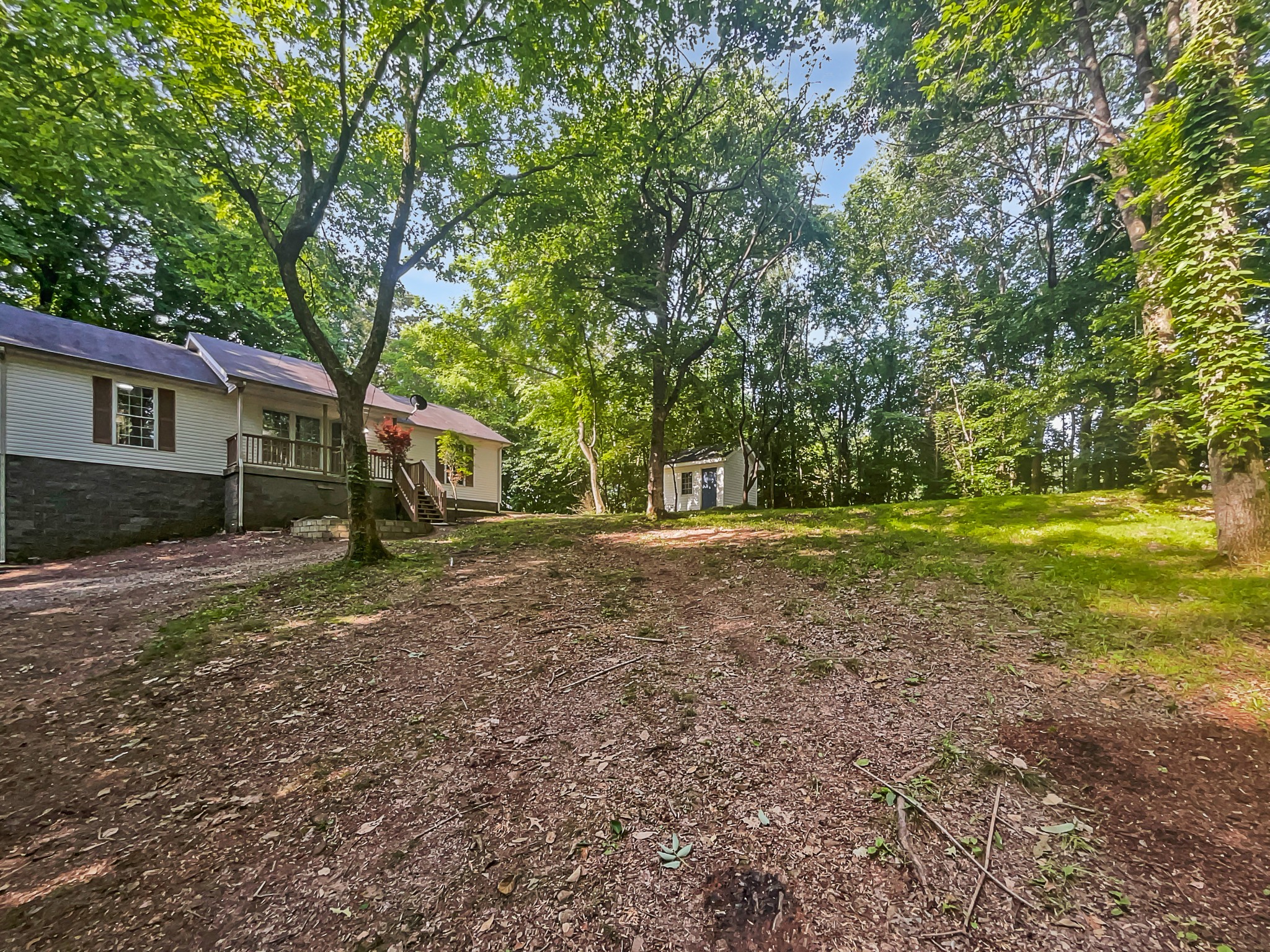 108 Nancy Avenue Pleasant View, TN 37146 - Photo 9 of 20 a view of a house with yard and a tree