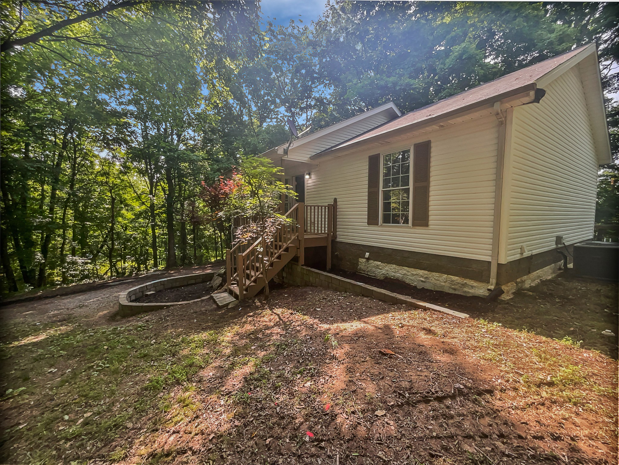108 Nancy Avenue Pleasant View, TN 37146 - Photo 10 of 20 a view of a house with a yard