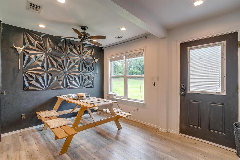 3147 Tin Top Road Weatherford, TX 76087 - Photo 16 of 40 a dining room with furniture and window