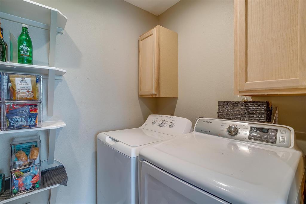 3147 Tin Top Road Weatherford, TX 76087 - Photo 21 of 40 a utility room with dryer and washer